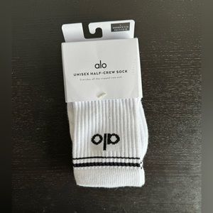 Alo unisex half crew sock. Large women’s. White and black. Never worn